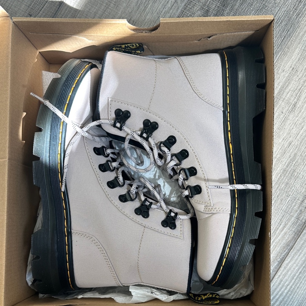 Dr. Martens Light Gray Combat Boots with Black Soles and Yellow Stitching